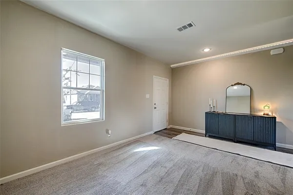 a view of room with window wooden floor and window