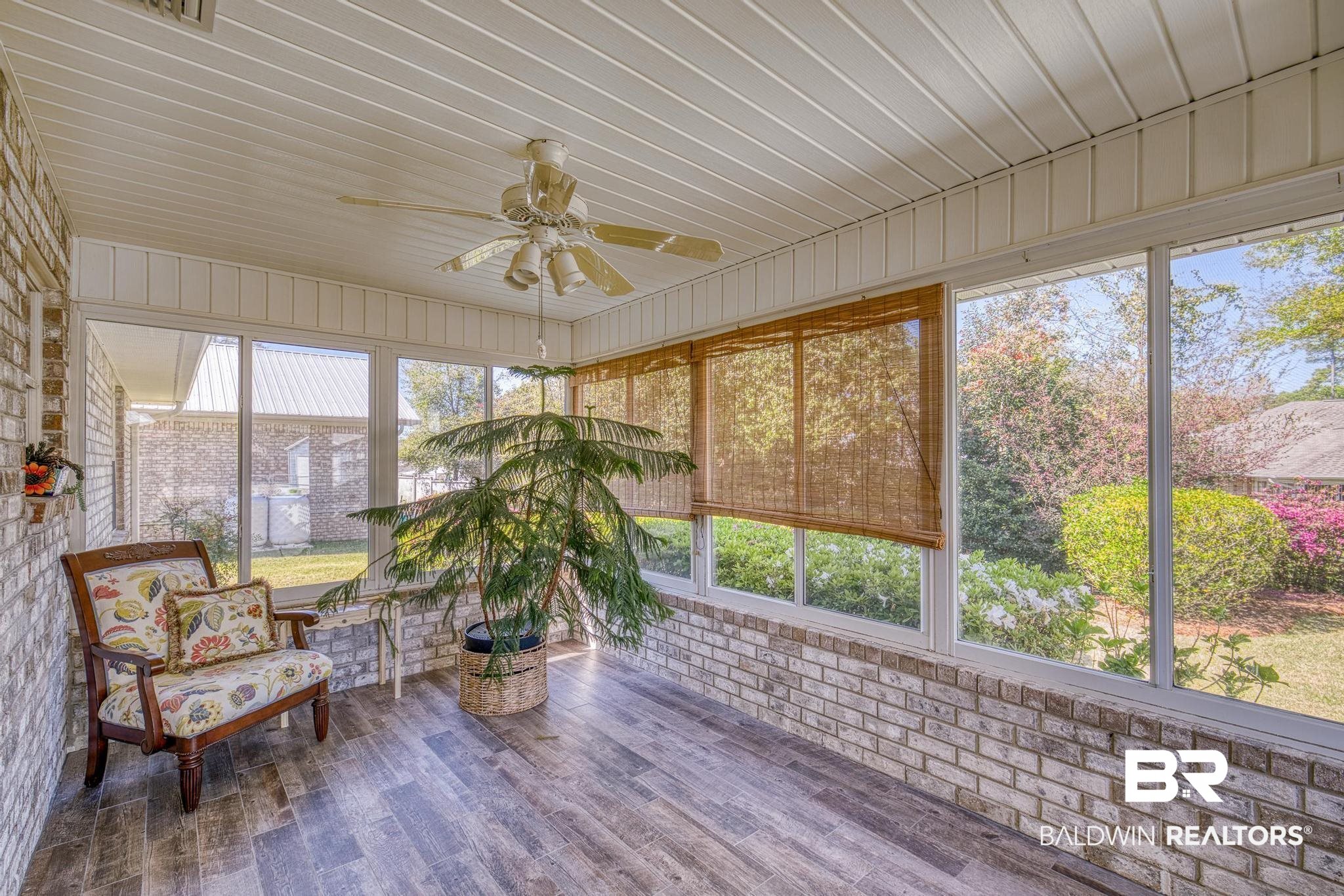 2881 Eslava Circle Lillian, AL 36549 - Photo 24 of 58 Sunroom featuring a ceiling fan