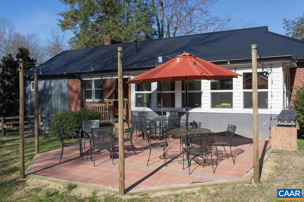 1612 Keith Valley Road Charlottesville, VA 22901 - Photo 24 of 30 a patio with table and chairs
