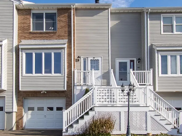a front view of a house with a balcony