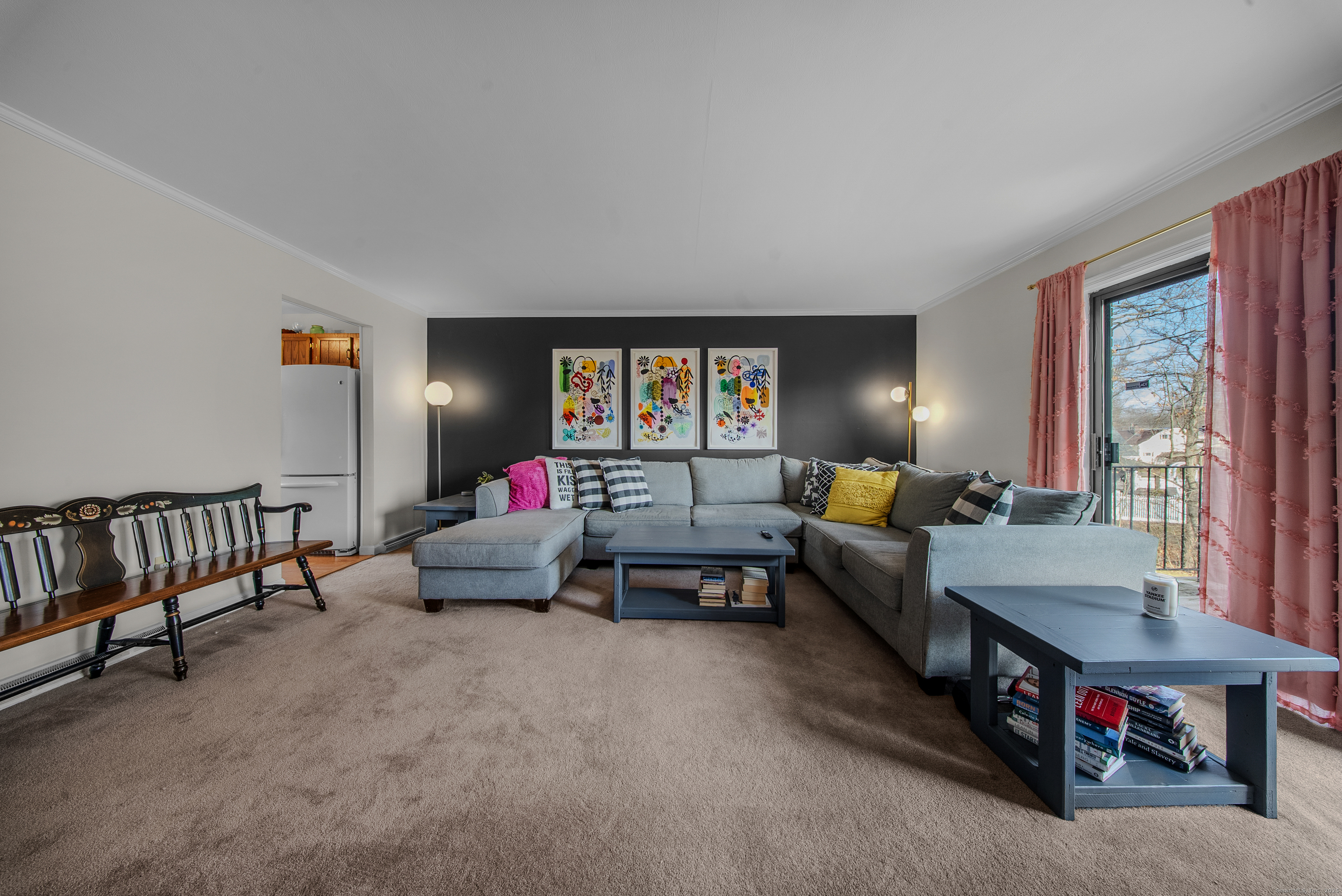 83 Carriage Drive, Unit 83 Milford, CT 06460 - Photo 12 of 33 a living room with furniture and a window