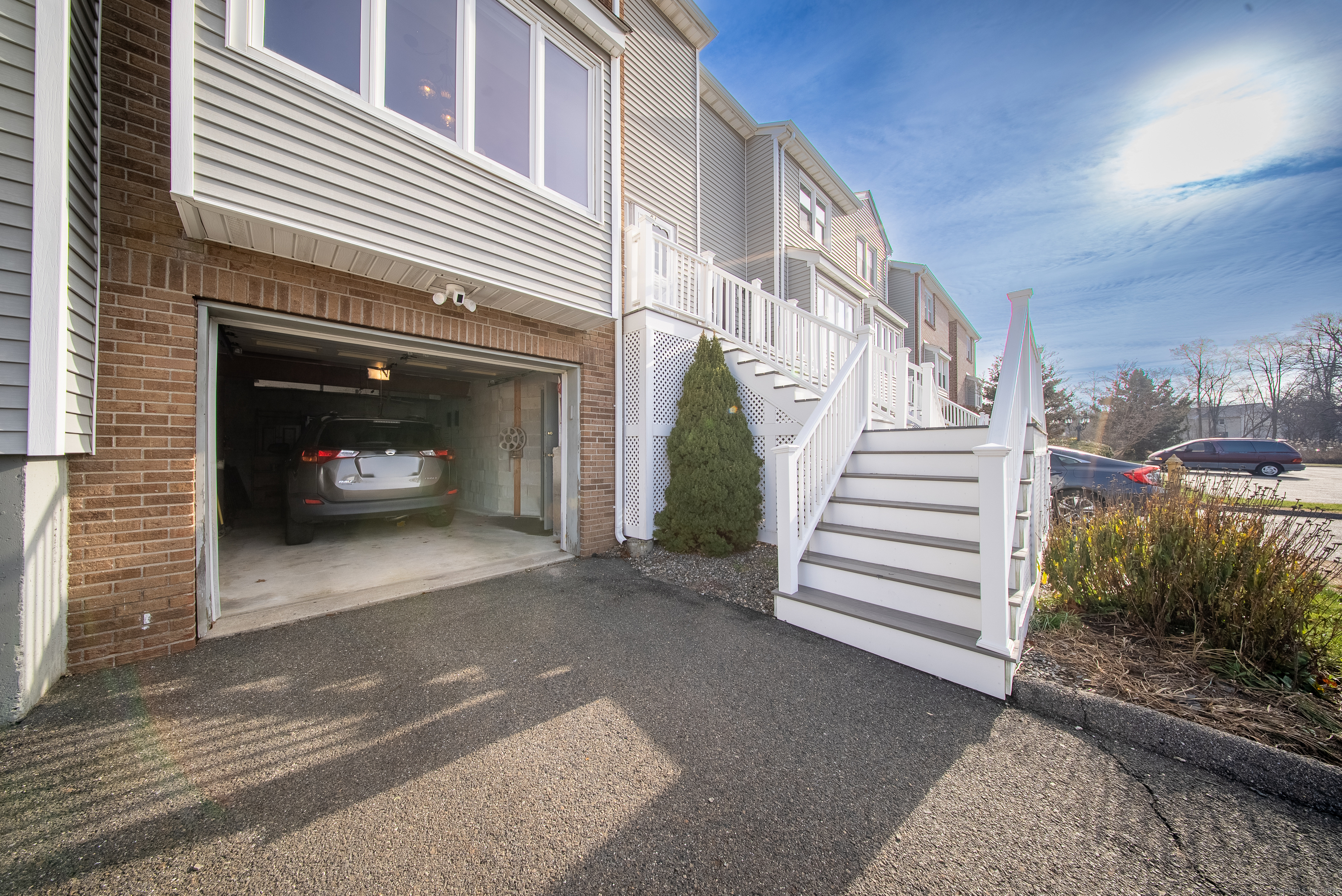83 Carriage Drive, Unit 83 Milford, CT 06460 - Photo 29 of 33 a view of a house with a small yard