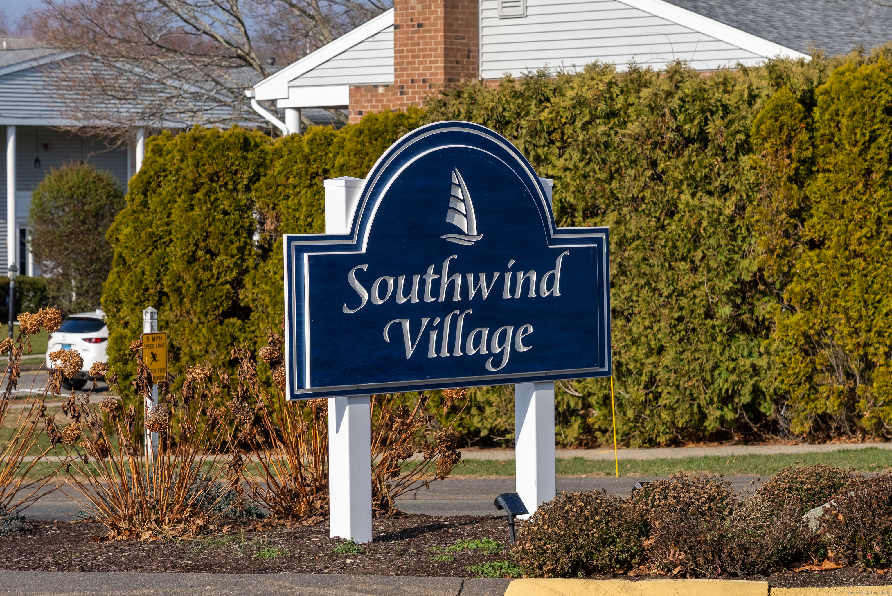 83 Carriage Drive, Unit 83 Milford, CT 06460 - Photo 30 of 33 a sign that is on the side of a building