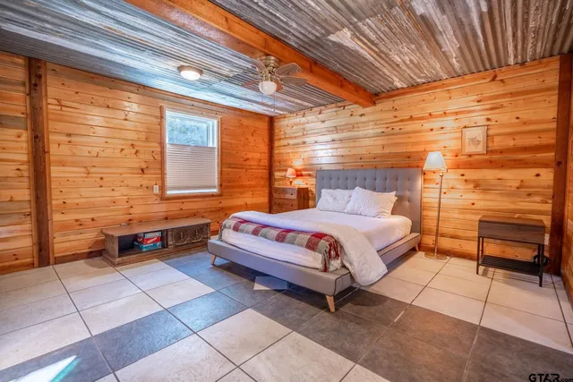 a bathroom with a bathtub and shower