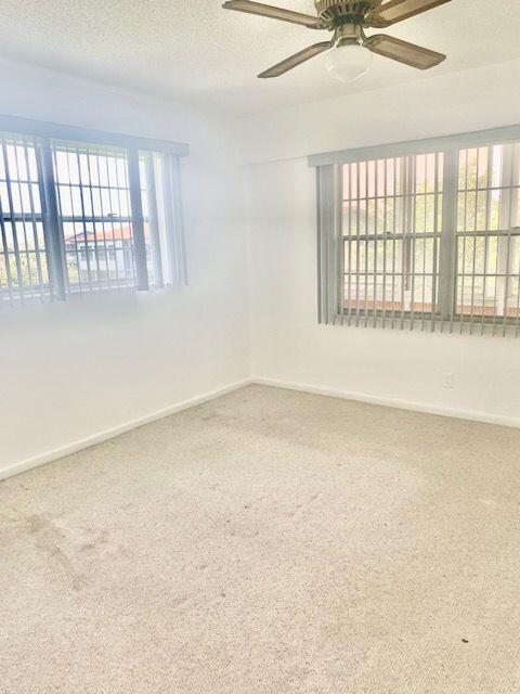207 Suffolk F Boca Raton, FL 33434 - Photo 8 of 37 Master Bedroom