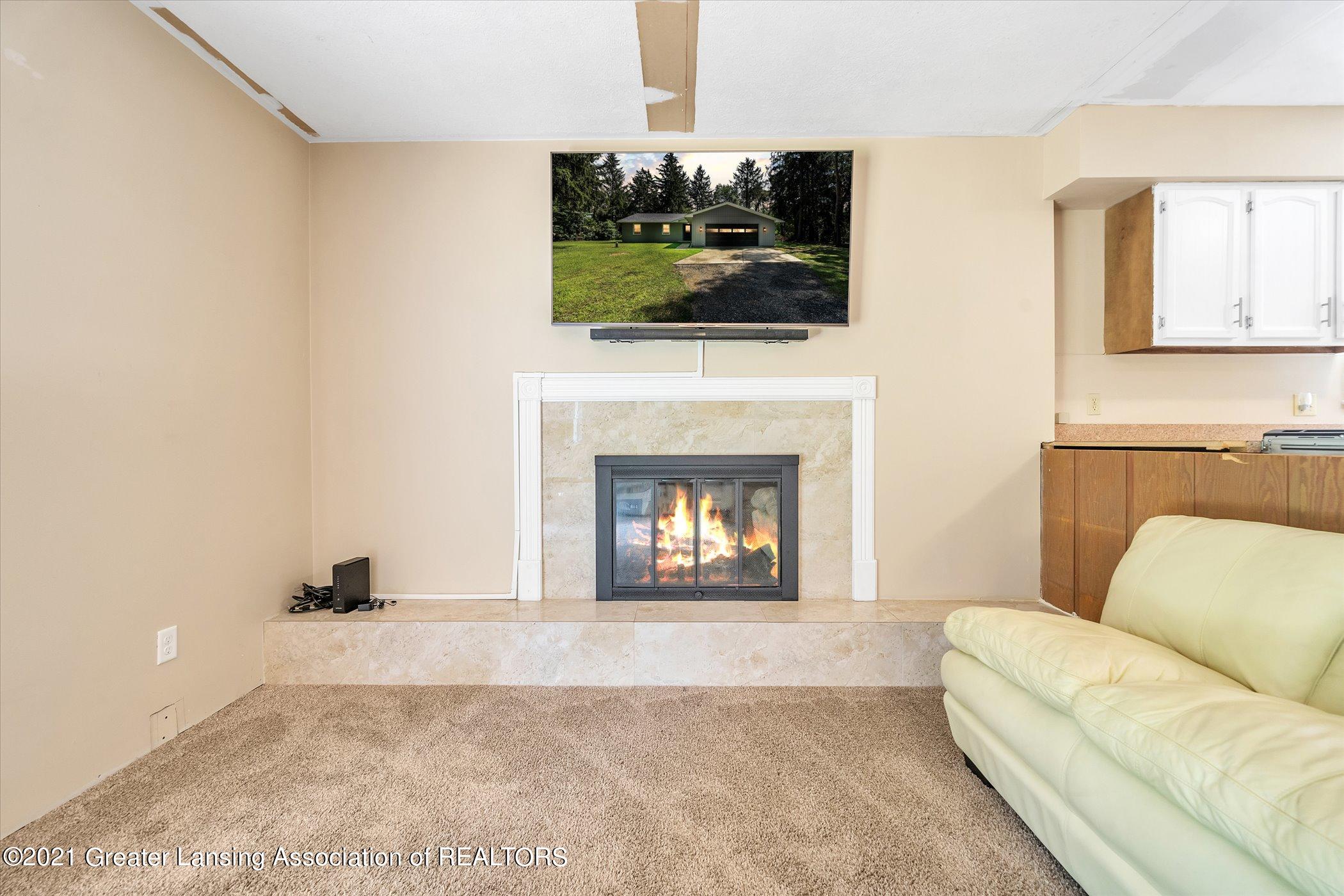 12159 Pine Ridge Drive Perry, MI 48872 - Photo 9 of 40 09-12159-Pine-Ridge-Dr-WindowStill-Real-