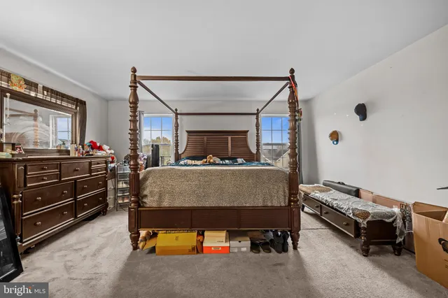 a bathroom with a sink double vanity and a mirror