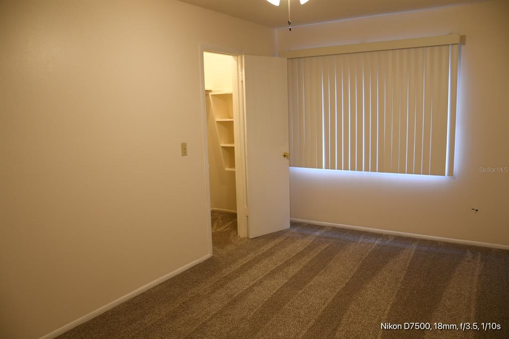 1700 Southwest 16th Court, Unit M21 Gainesville, FL 32608 - Photo 8 of 13 an empty room with a natural light