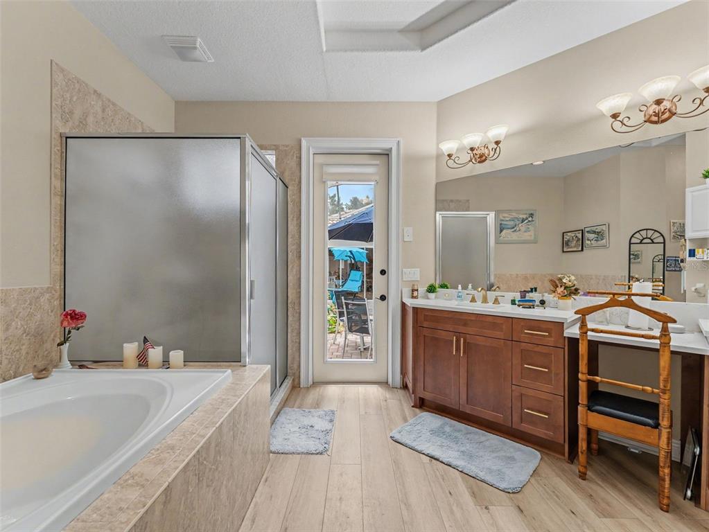 8910 Jericho Road Weeki Wachee, FL 34613 - Photo 35 of 52 a bedroom with a bed and a dresser