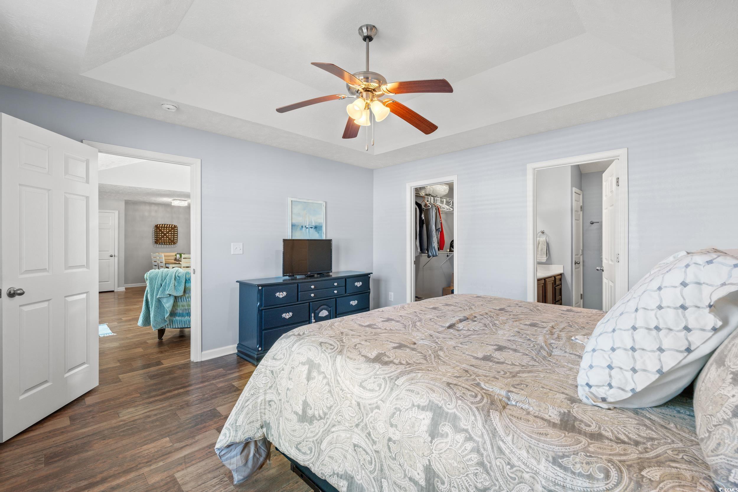 166 Woodland Park Loop Murrells Inlet, SC 29576 - Photo 13 of 39 Bedroom with ensuite bath, a spacious closet, ceil