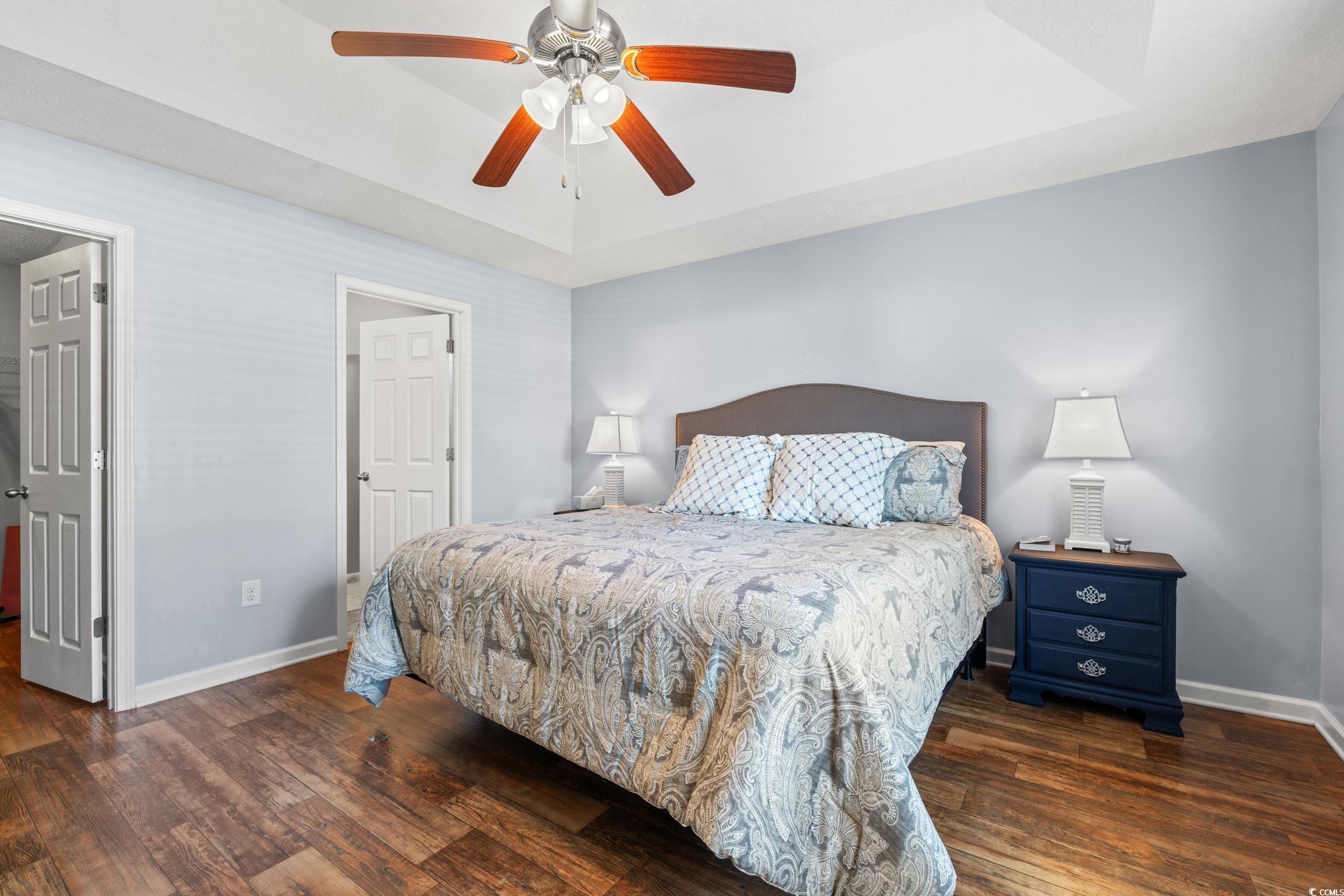166 Woodland Park Loop Murrells Inlet, SC 29576 - Photo 14 of 39 Bedroom with dark hardwood / wood-style floors and