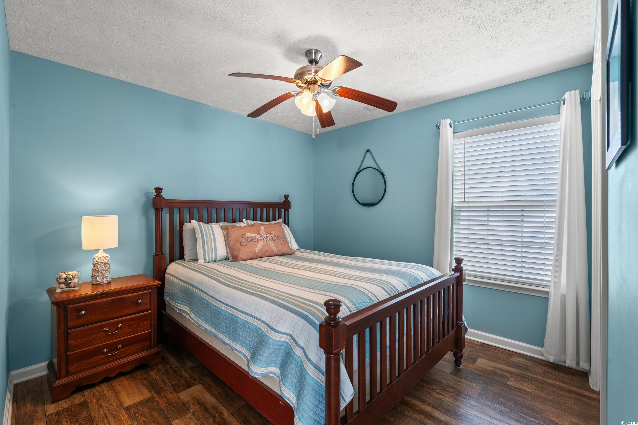 166 Woodland Park Loop Murrells Inlet, SC 29576 - Photo 19 of 39 Bedroom featuring ceiling fan, dark hardwood / woo