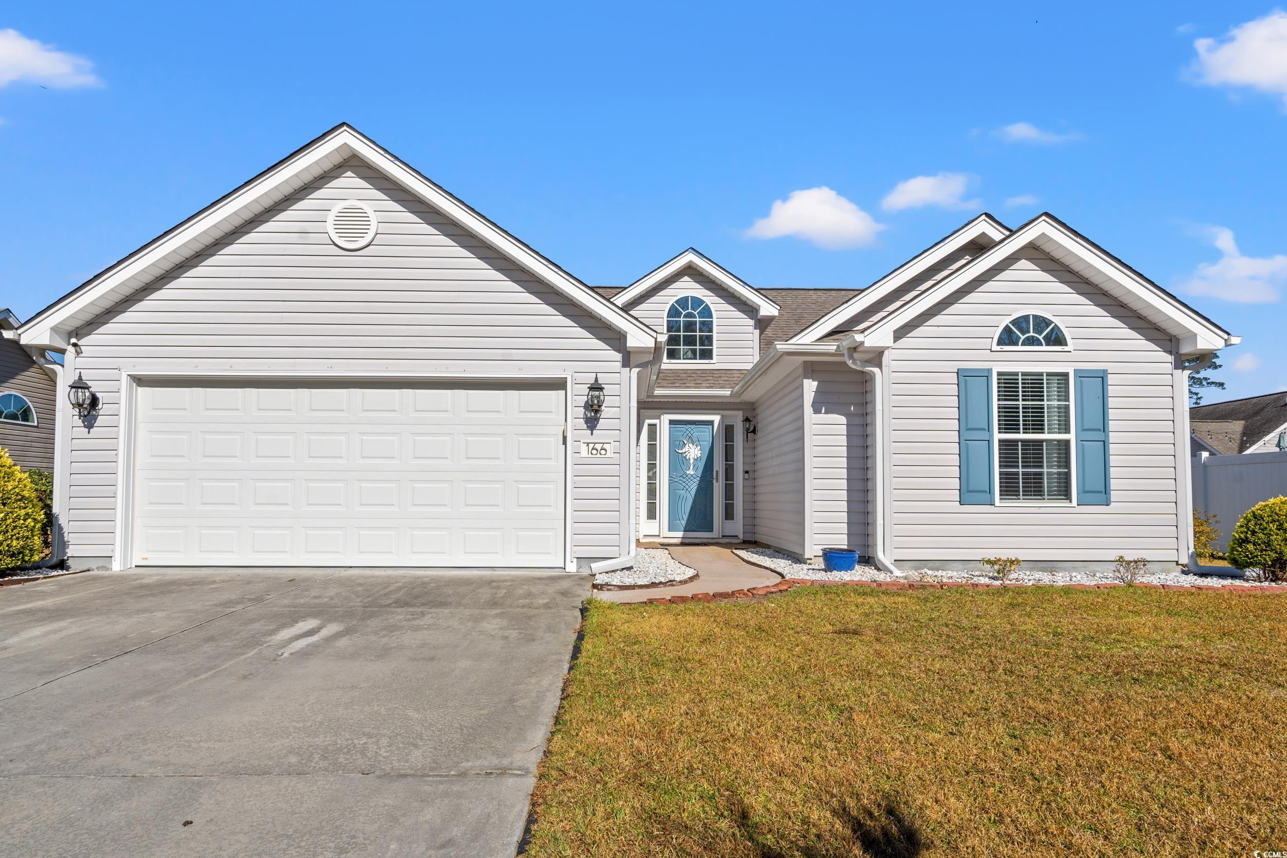 166 Woodland Park Loop Murrells Inlet, SC 29576 - Photo 30 of 39 View of front of house featuring a front yard and