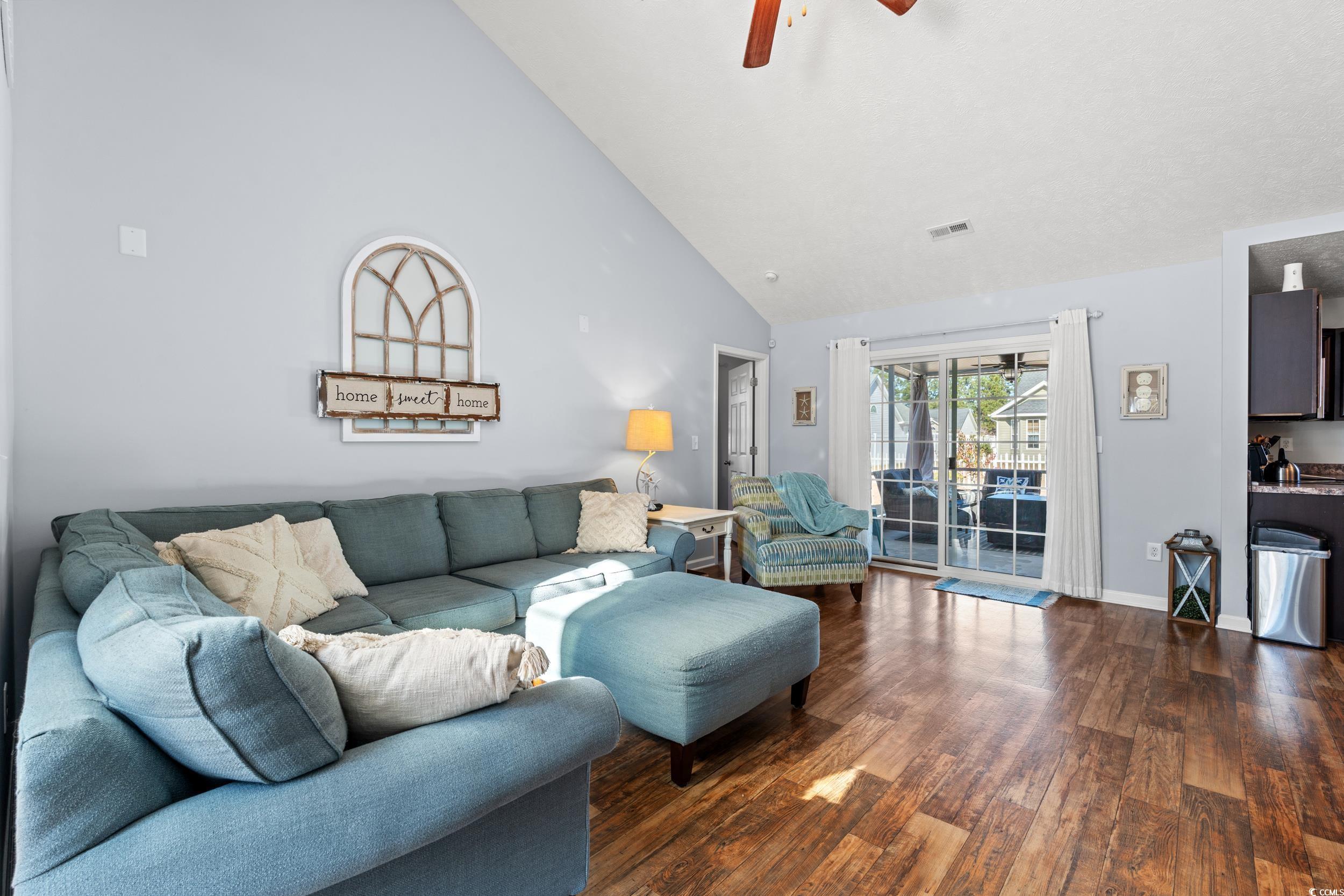 166 Woodland Park Loop Murrells Inlet, SC 29576 - Photo 4 of 39 Living room featuring ceiling fan, dark wood-type