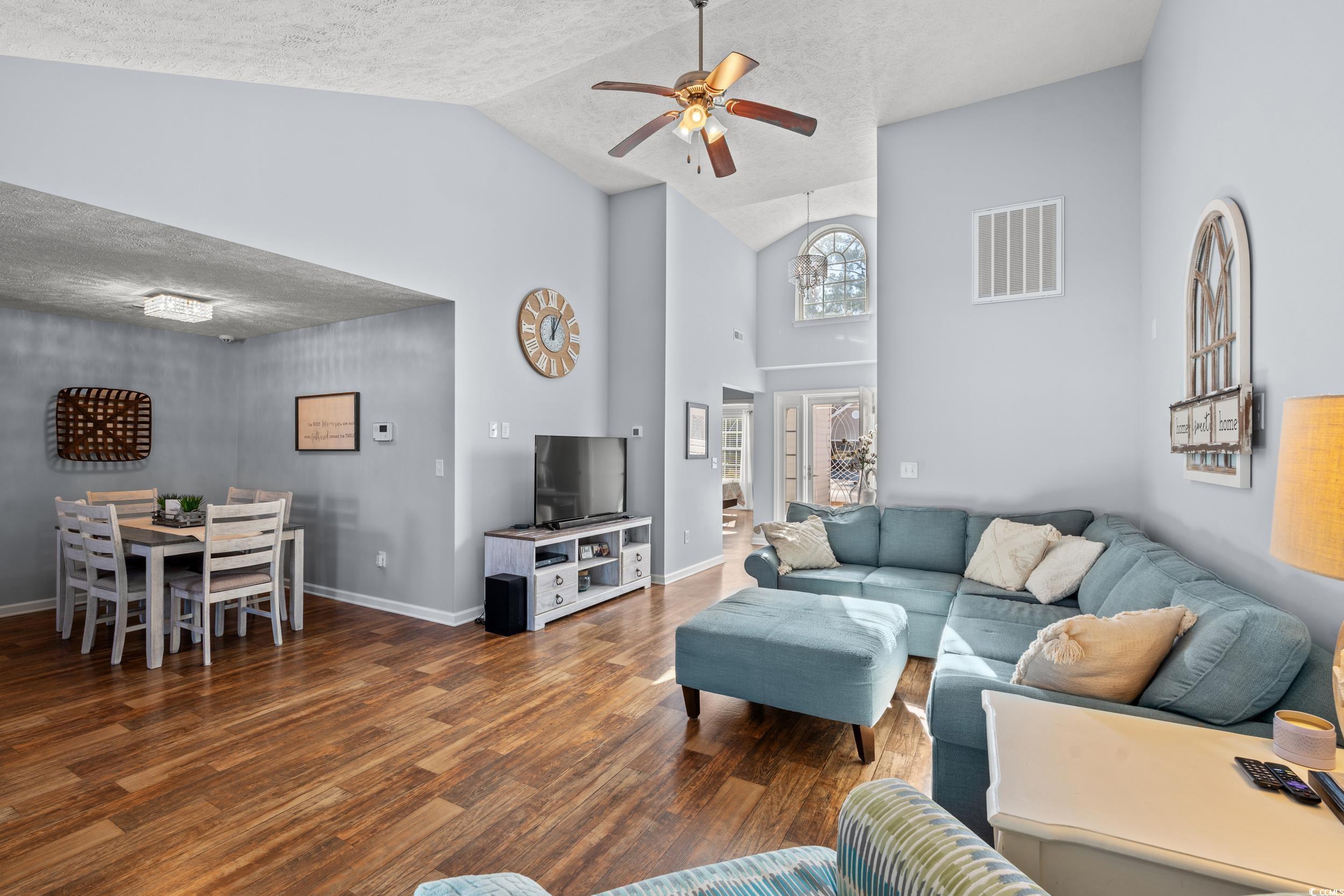 166 Woodland Park Loop Murrells Inlet, SC 29576 - Photo 5 of 39 Living room featuring ceiling fan, dark hardwood /