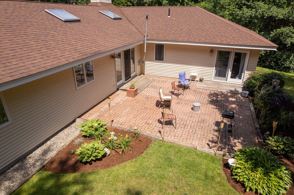 94 Dudley Road Sutton, MA 01590 - Photo 37 of 42 a aerial view of a house with a yard