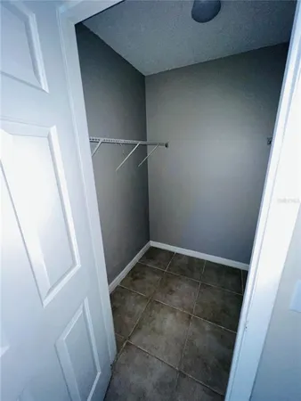 a view of an empty walk in closet
