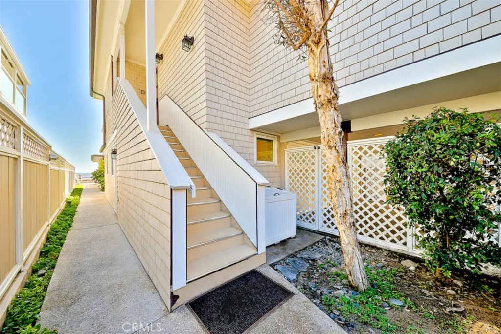 35087 Beach Road Dana Point, CA 92624 - Photo 15 of 31 a view of a house with wooden floor and iron stairs