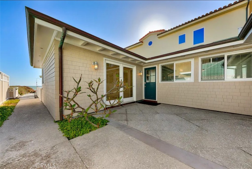 35087 Beach Road Dana Point, CA 92624 - Photo 2 of 31 a view of a house with a garden