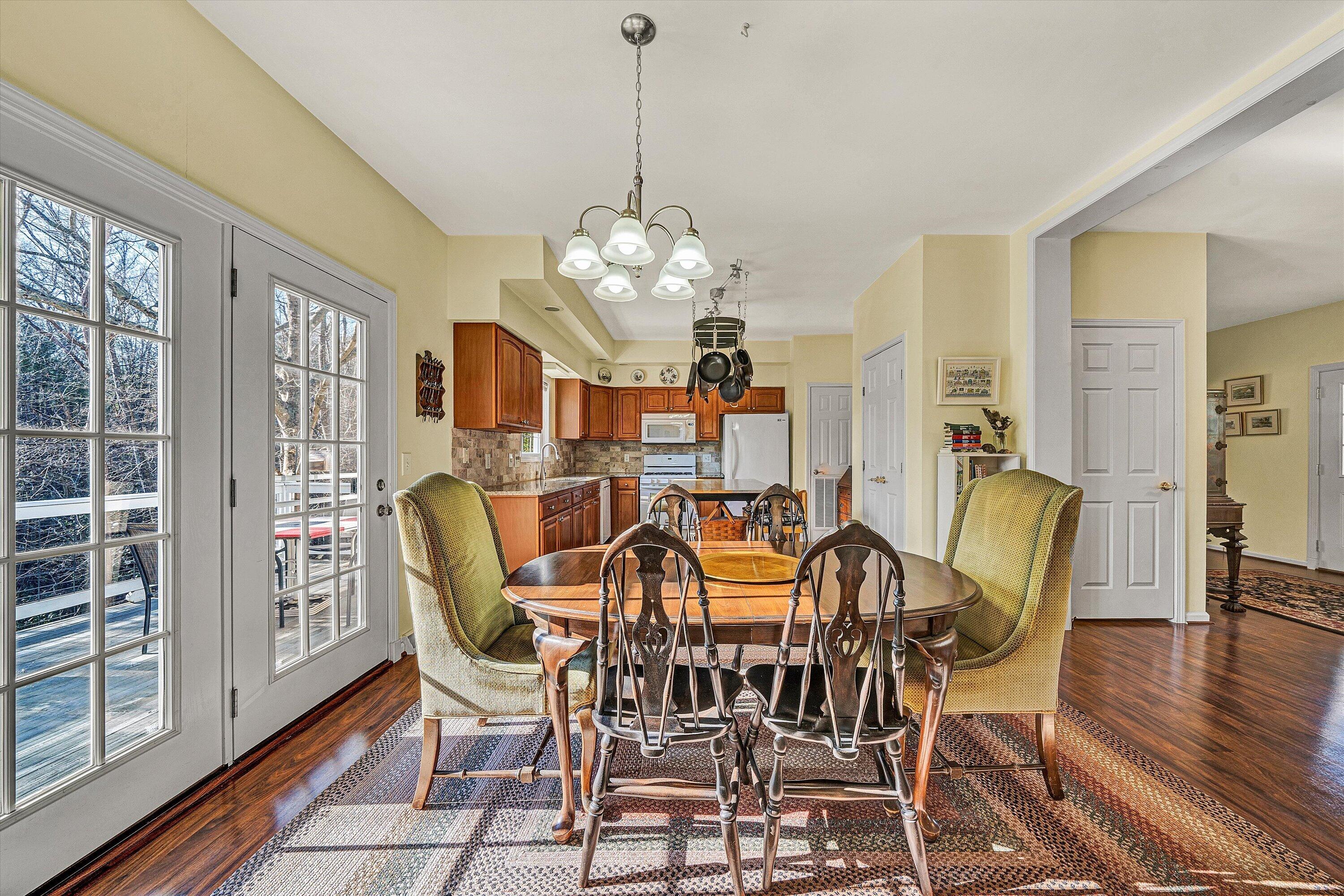 1164 Dry Hill Road Ferrum, VA 24088 - Photo 17 of 84 a view of a dining room with furniture window and wooden floor