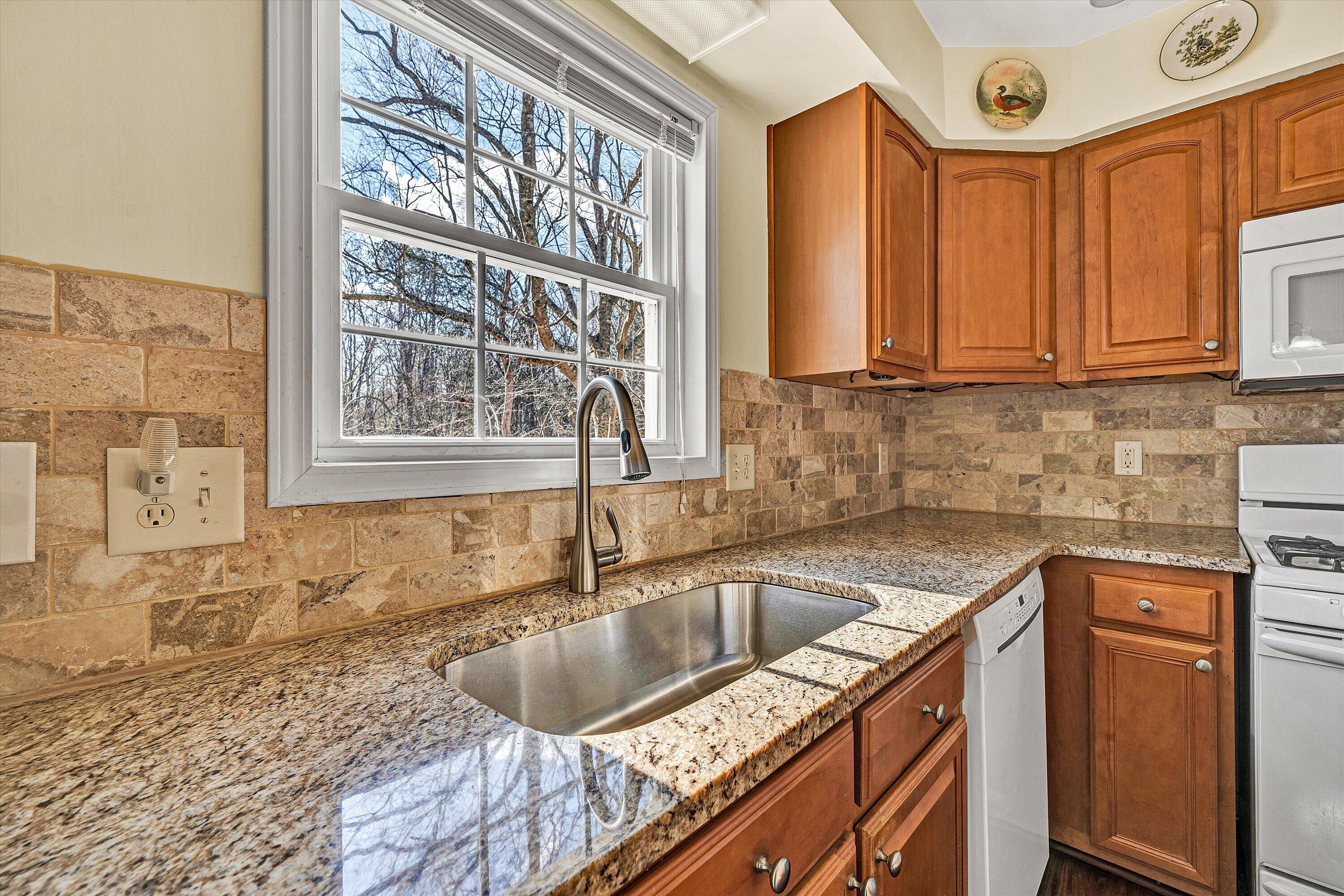 1164 Dry Hill Road Ferrum, VA 24088 - Photo 24 of 84 a kitchen that has a sink and a window