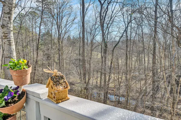 a bed room with bed and a window