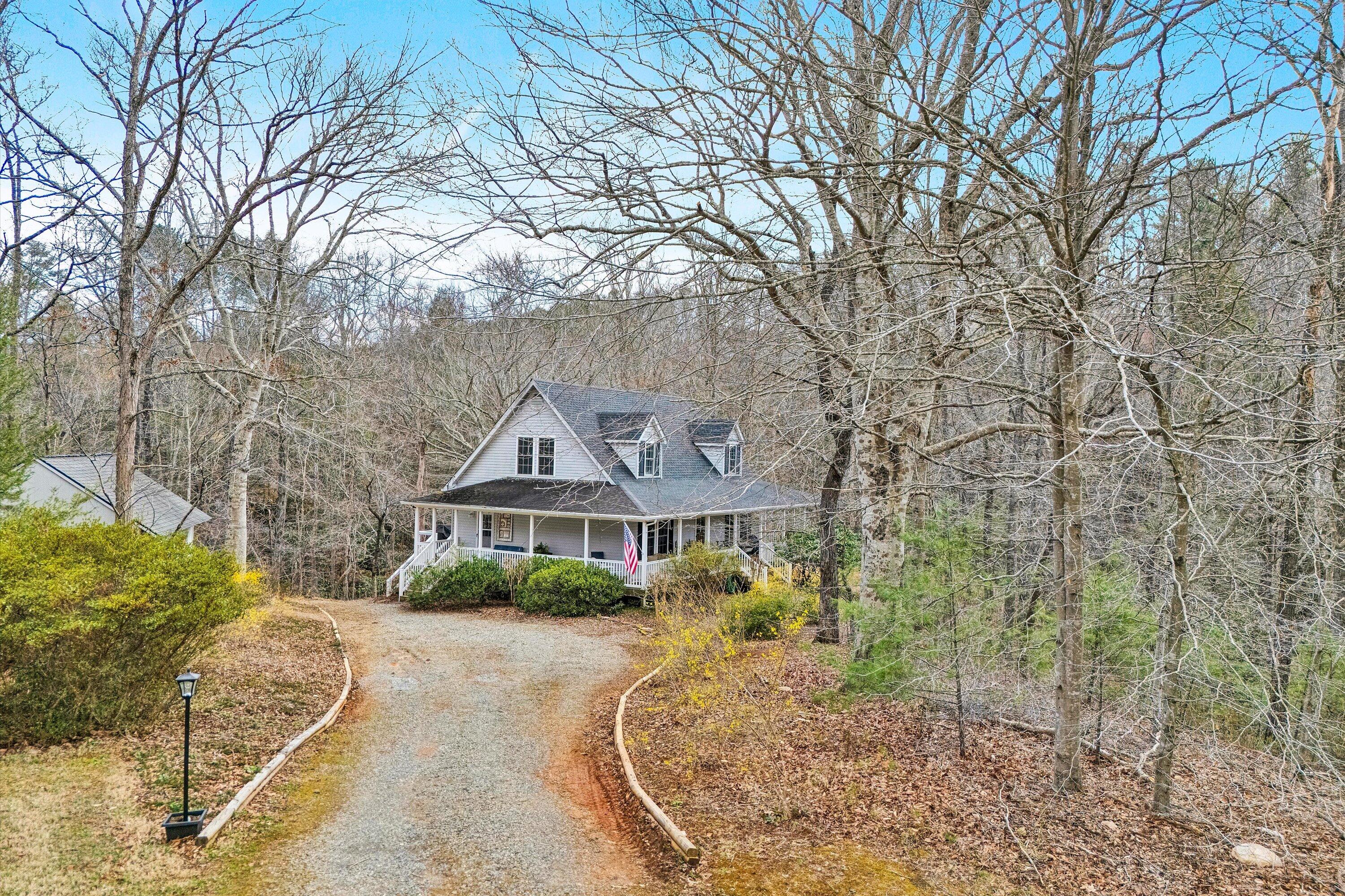1164 Dry Hill Road Ferrum, VA 24088 - Photo 3 of 84 a front view of a house with a yard and large tree