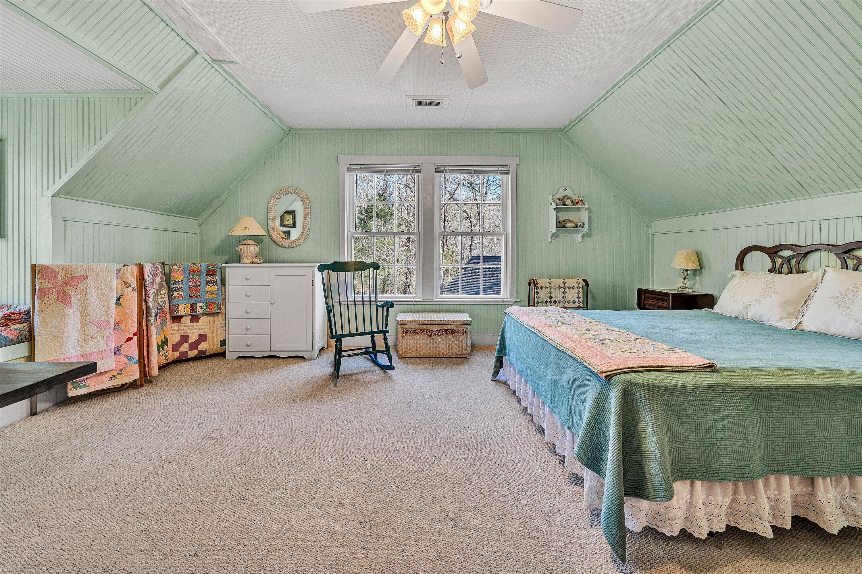 1164 Dry Hill Road Ferrum, VA 24088 - Photo 37 of 84 a spacious bedroom with a bed and a large window