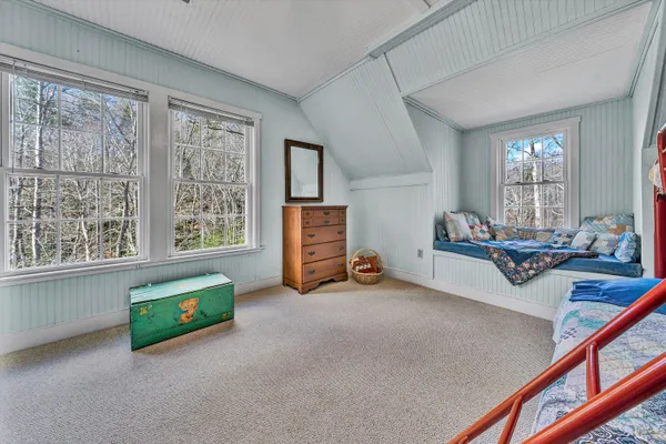 a view of yard with swimming pool and trees