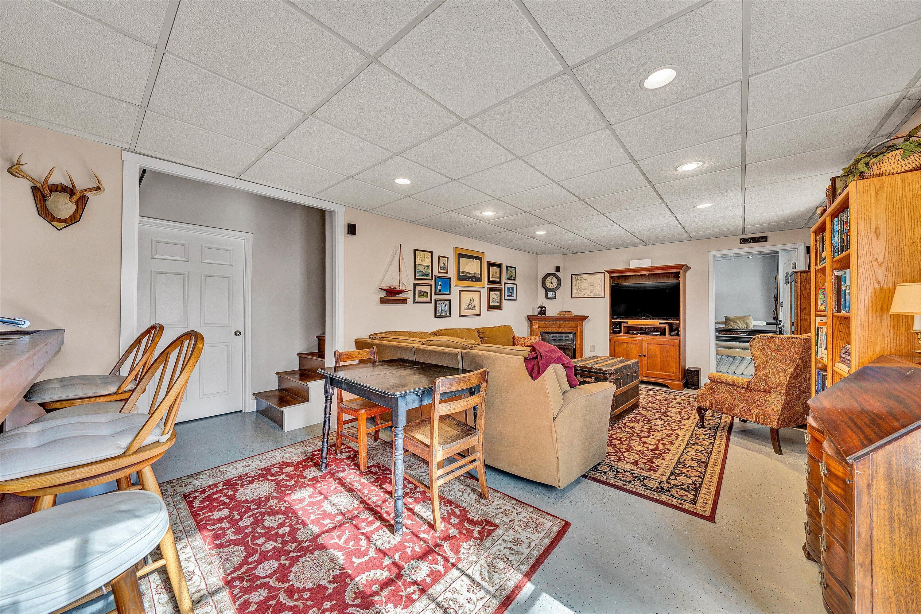 1164 Dry Hill Road Ferrum, VA 24088 - Photo 51 of 84 a living room with furniture a flat screen tv and a table