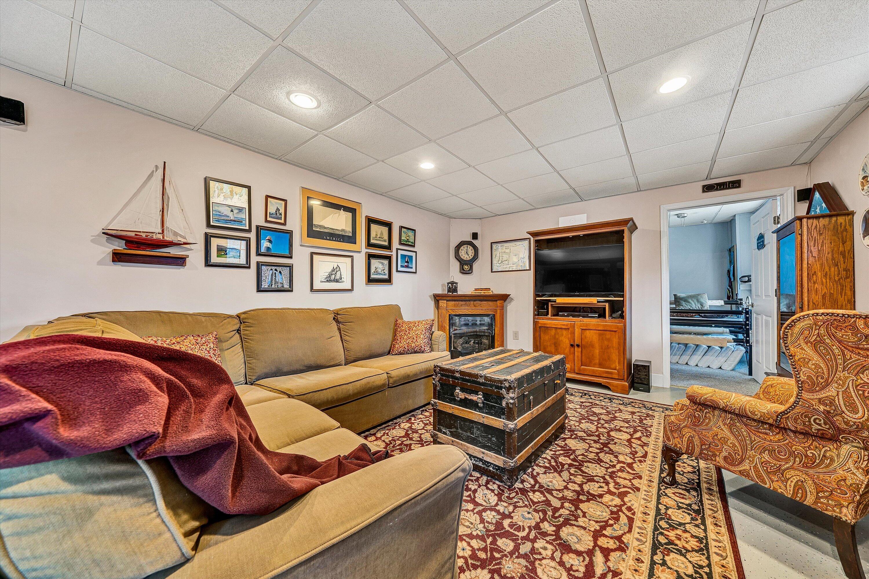 1164 Dry Hill Road Ferrum, VA 24088 - Photo 53 of 84 a living room with furniture a flat screen tv and kitchen view