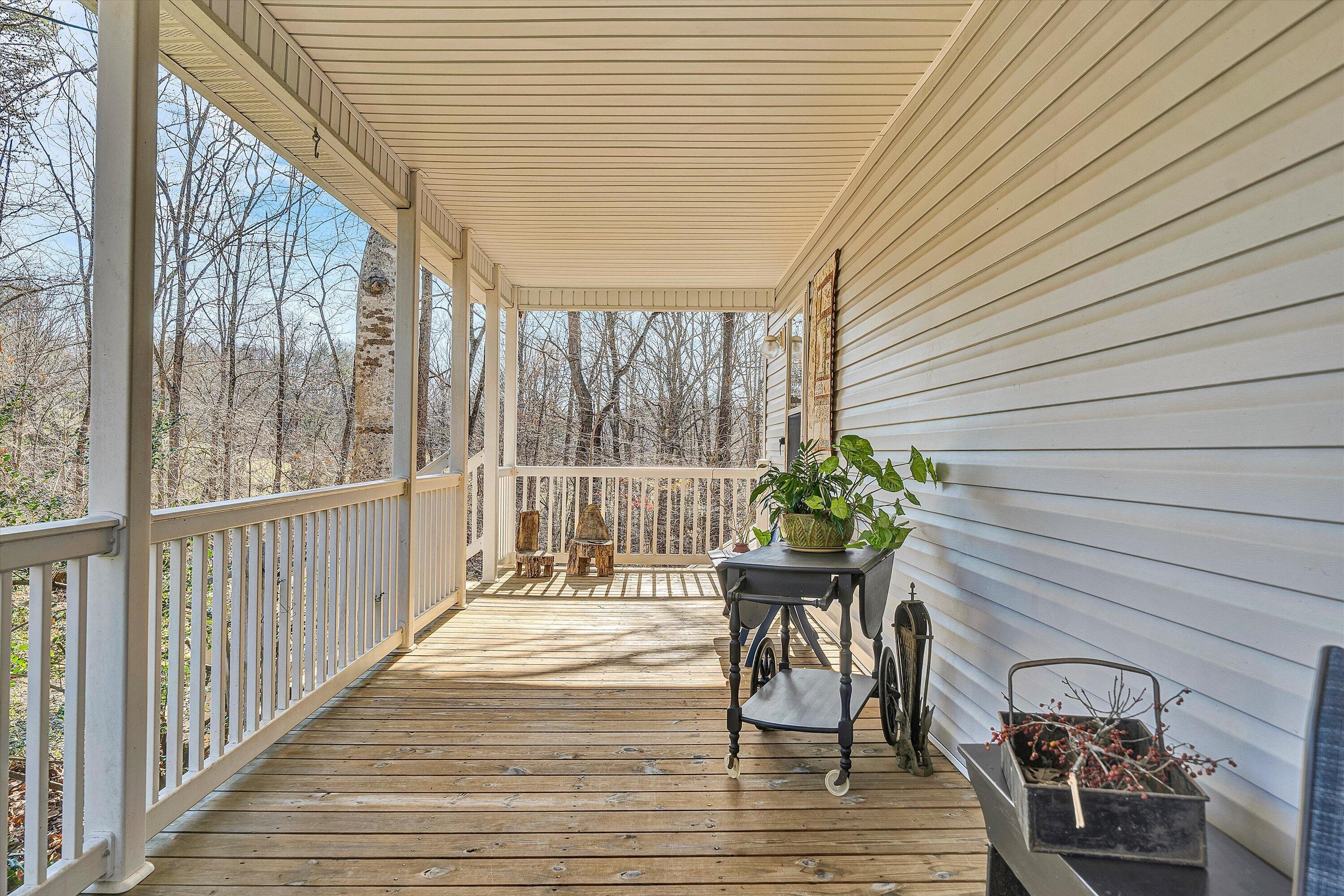 1164 Dry Hill Road Ferrum, VA 24088 - Photo 10 of 84 a view of a two chairs and table in the balcony