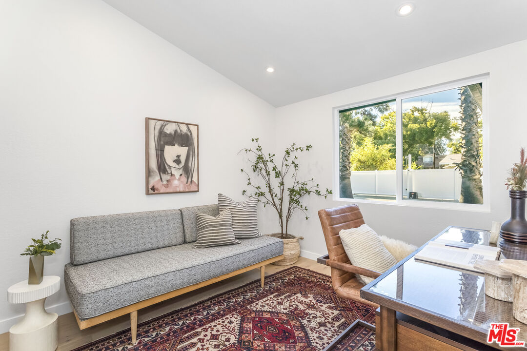 950 North Summit Avenue Pasadena, CA 91103 - Photo 32 of 37 a living room with furniture and a large window