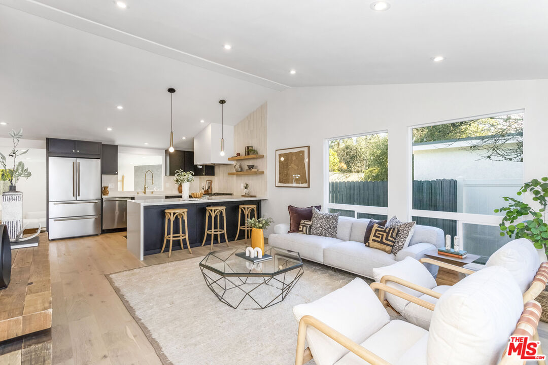 950 North Summit Avenue Pasadena, CA 91103 - Photo 10 of 37 a living room with furniture kitchen and a table
