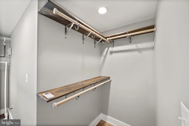 a room with a window and storage space