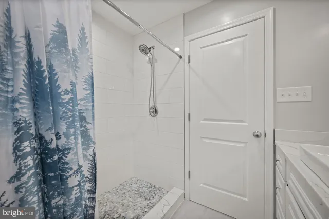 a view of a hallway with washer and dryer