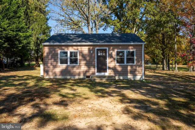 a view of a house with a street