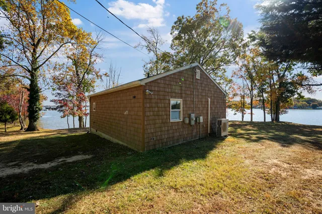 a view of a backyard of the house