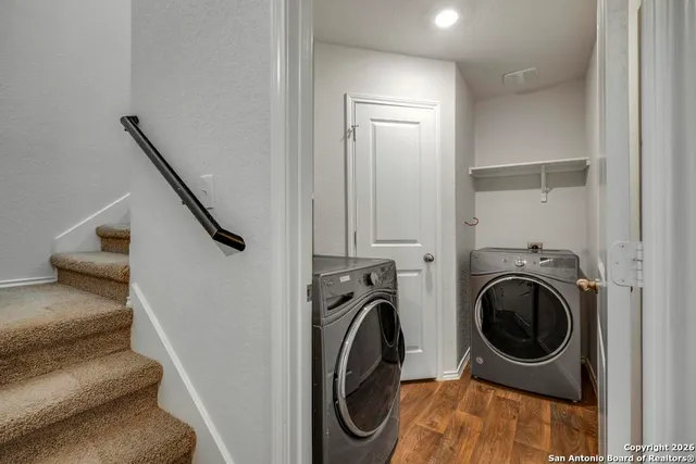 a utility room with dryer and washer