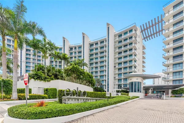 a view of a balcony next to a lake view