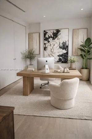 a view of empty room with a potted plant