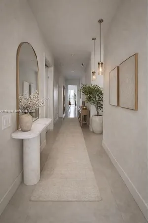 a bed room with a bed and a chandelier