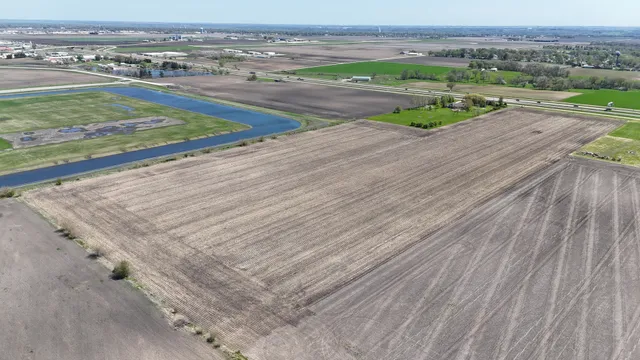an empty room with view of lake and mountain view