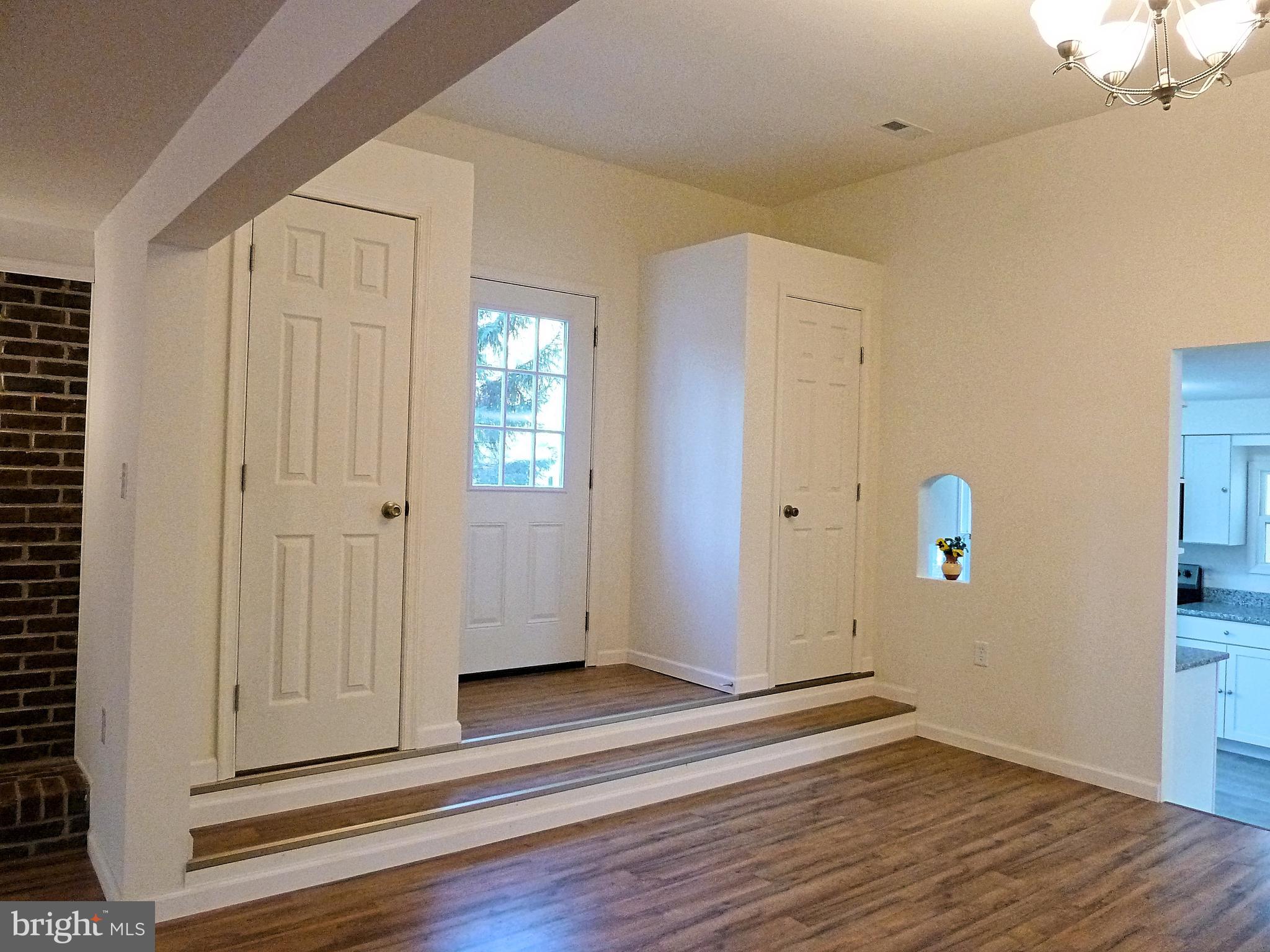 266 Thomson Street Summit Point, WV 25446 - Photo 33 of 46 High ceiling in the entry and dining area