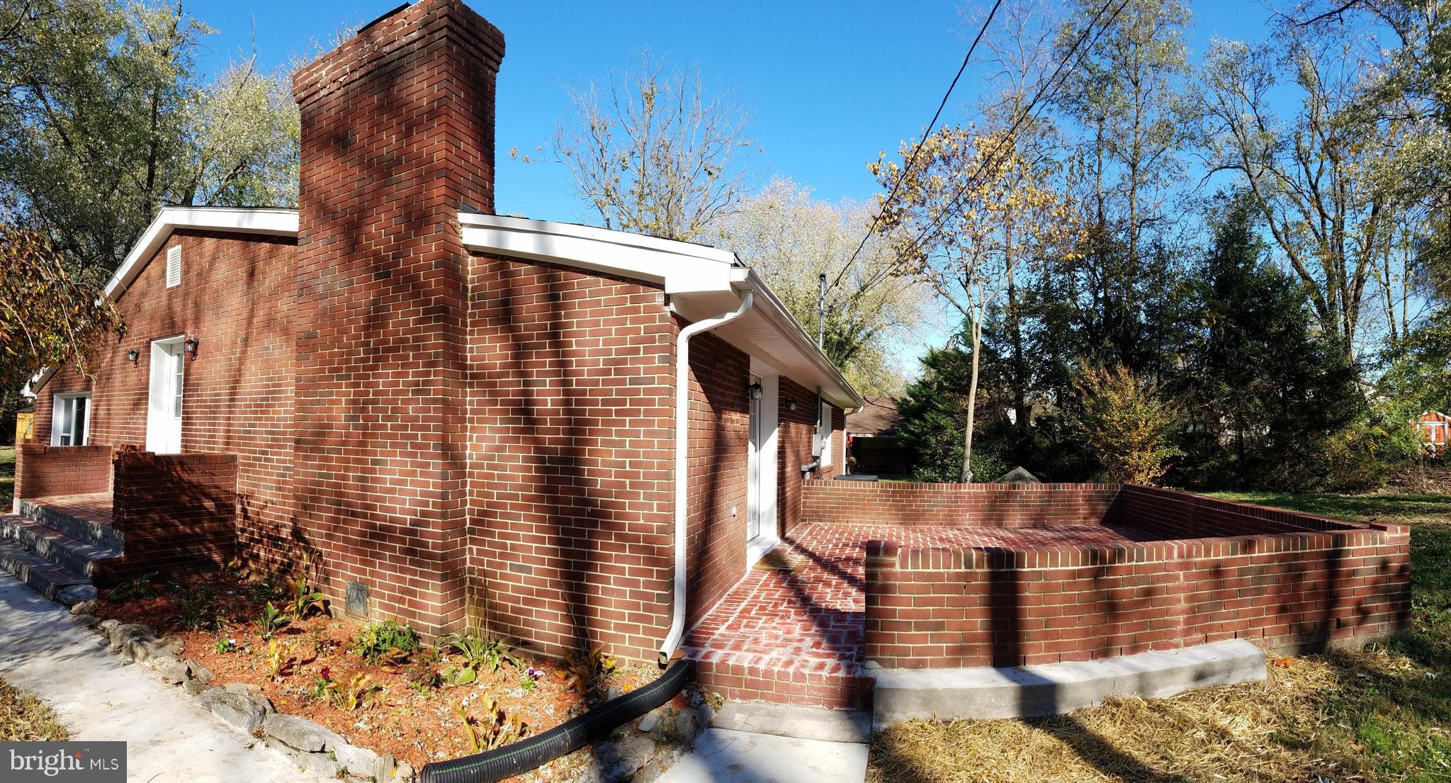 266 Thomson Street Summit Point, WV 25446 - Photo 7 of 46 A lovely brick patio to enjoy, private too.
