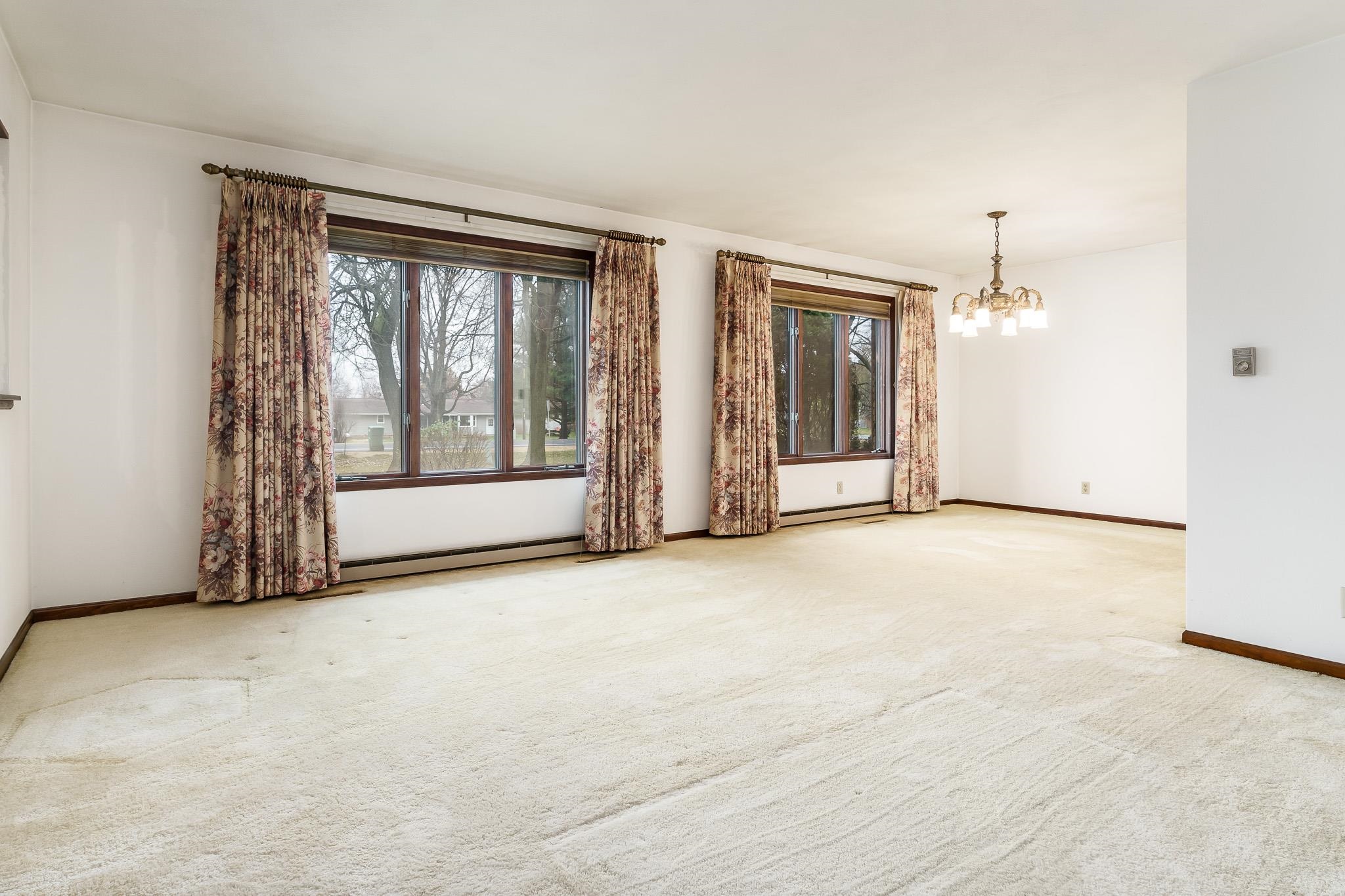 6644 Belvidere Road Roscoe, IL 61073 - Photo 11 of 42 an empty room with windows and closet
