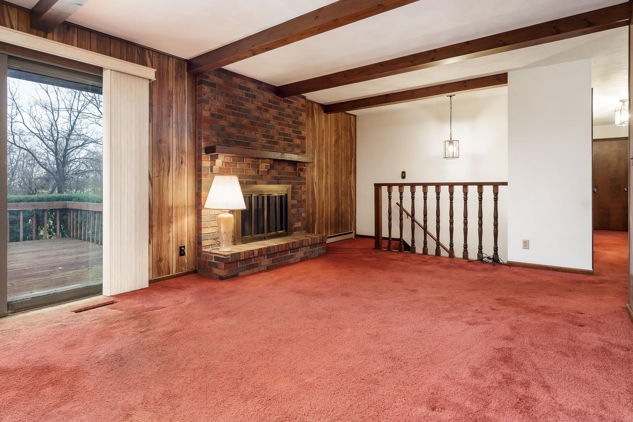 6644 Belvidere Road Roscoe, IL 61073 - Photo 23 of 42 a view of an empty room with window and fire place