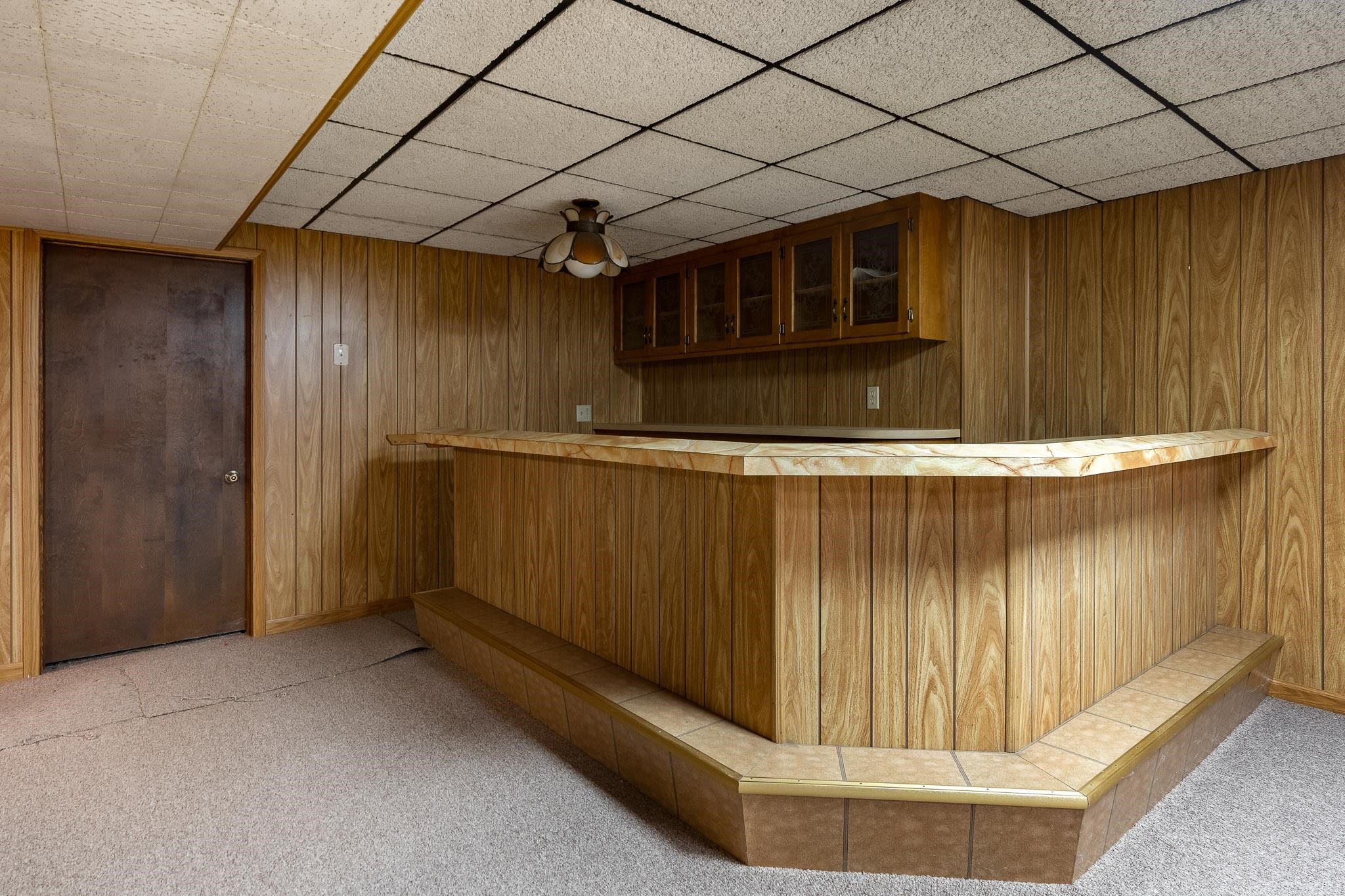 6644 Belvidere Road Roscoe, IL 61073 - Photo 40 of 42 a view of entryway with wooden walls