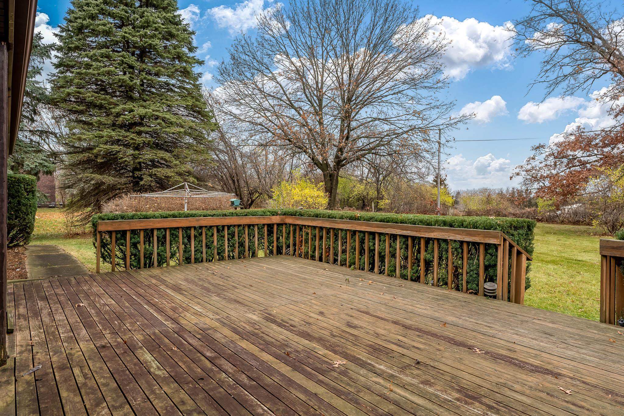 6644 Belvidere Road Roscoe, IL 61073 - Photo 10 of 42 a view of deck with a large trees