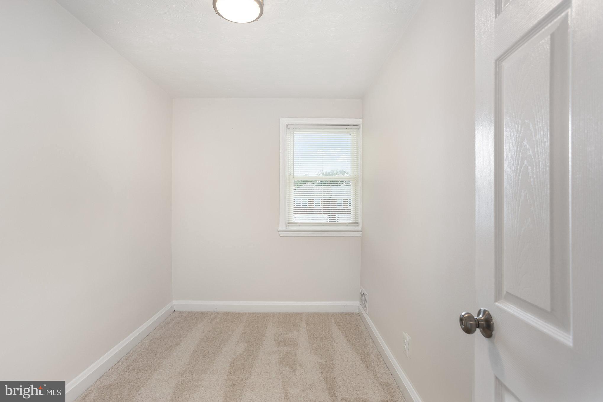 53 South Hawthorne Road Middle River, MD 21220 - Photo 12 of 29 a view of a room with rack on the wall